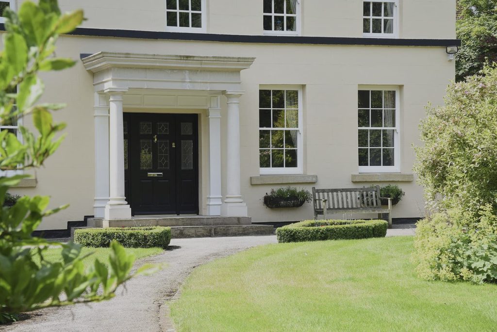 Traditional sash windows on a large house